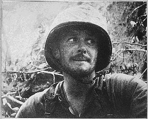 Photograph of Marine suffering from
        combat fatigue
