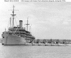 Photograph of submarine tender Canopus with several submarines