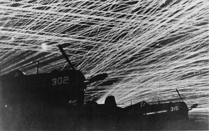 Photograph of heavy antiaircraft fire around friendly aircraft