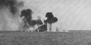Photograph of Gambier Bay under attack