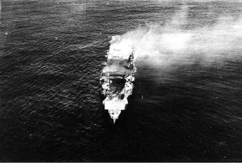 Photograph of Hiryu burning after dive bomber attack at
          Midway