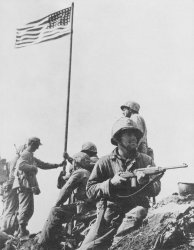 The first flag goes up at Suribachi