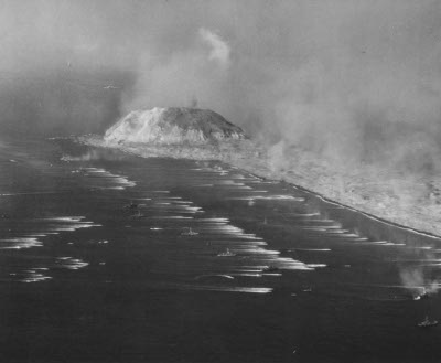 Photograph of landing craft approaching Iwo Jima