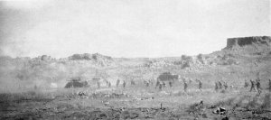 Photograph of Marine infantry and tanks advancing
