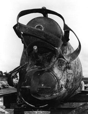 Photograph of Type 97 torpedoes in torpedo tubes of a wrecked midget submarine