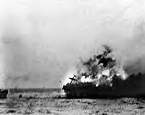 Photograph of explosion on carrier
        Lexington