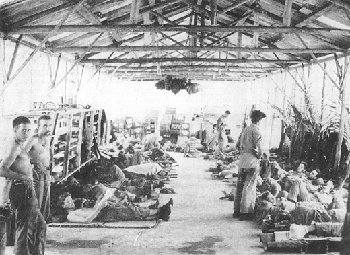 Photograph of malaria patients in a makeshift ward on Guadalcanal