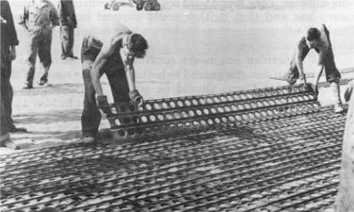 Photograph of engineers laying Marston mat