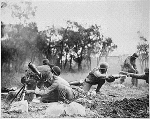 Photograph of a mortar crew in action