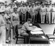 Nimitz signing the Japanese surrender for the United States