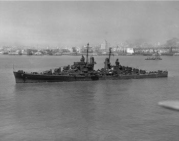 Photograph of San Francisco Bay with cruiser Oakland in foreground