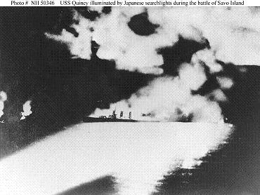 USS
        Quincy illuminated by Japanese searchlights at the Battle of
        Savo Island