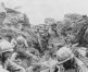 Marine command post taking cover in a gully