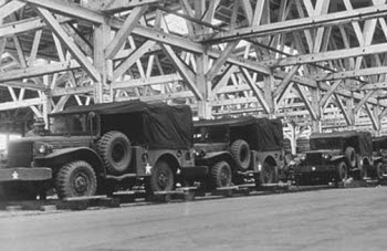 Photograph of WC 51 trucks preparing to embark