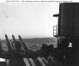 1.1" guns on cruiser Astoria fire at a seaplane