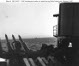 1.1" guns on cruiser Astoria fire at a seaplane